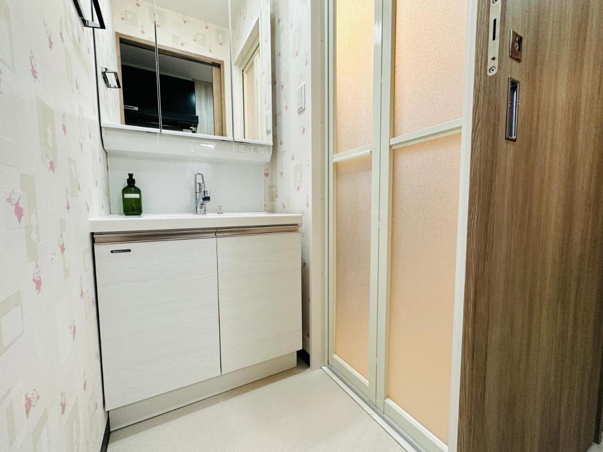 Apartamento 1102黒門市場1分!道頓堀まで徒歩8分!心斎橋まで徒歩9分!関西空港とusj直行電車バスあり *